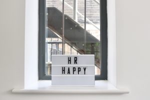 sign reading 'hr happy'